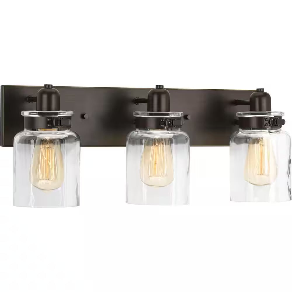 Progress Lighting Calhoun Collection 21-5/8 in. 3-Light Antique Bronze Clear Glass Farmhouse Urban Industrial Bathroom Vanity Light