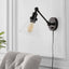 JONATHAN Y Cowie 8 in. Oil Rubbed Bronze Iron/Glass Adjustable LED Wall Sconce