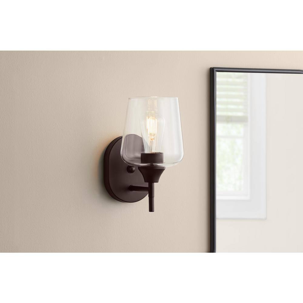 Hampton Bay Pavlen 5.5 in. 1-Light Bronze Sconce with Clear Glass Shade