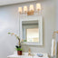 LNC Modern Classic Deep Gold Vanity Light 4-Light Arched Mirror Sconce with White Cone Fabric Shades for Powder Room