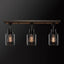Globe Electric Griffith 25 in. 3-Light Faux Wood and Matte Black Track Lighting with Clear Glass Shades